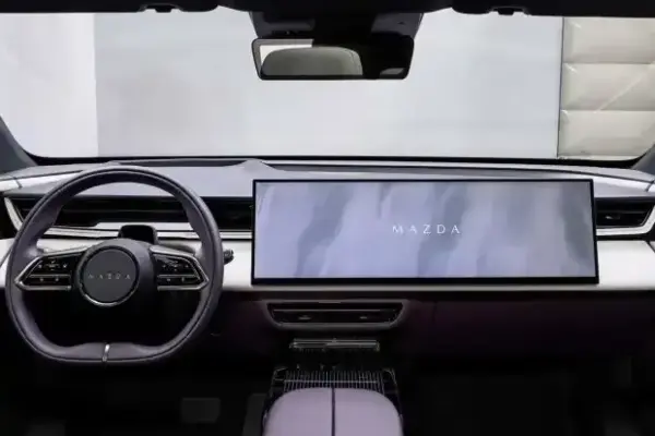 Mazda defends screen U-turn: "Market has changed"