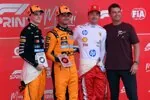 Lando Norris (McLaren), Oscar Piastri (McLaren) and Charles Leclerc (Ferrari) with Artemis astronaut Reid Wiseman