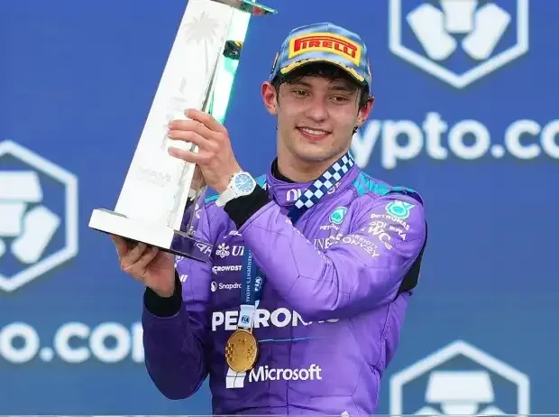Title image for the news: Kimi Antonelli with the winner's trophy in Miami 2026