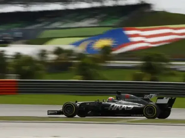 Title image for the news: Romain Grosjean (Haas VF-17) at the Formula 1 race in Malaysia
