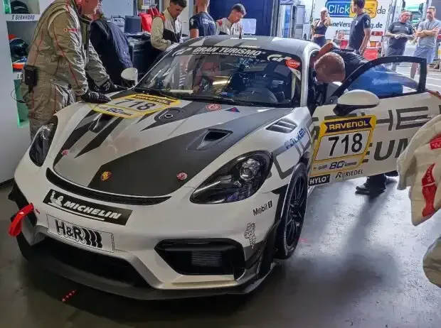 Title image for the news: This Porsche Cayman #718 is driven by Jörg Bergmeister and Timo Bernhard