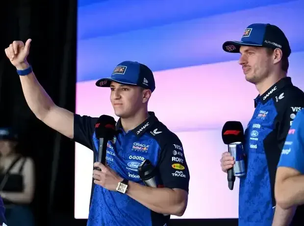 Title image for the news: Isack Hadjar next to his Red Bull teammate Max Verstappen