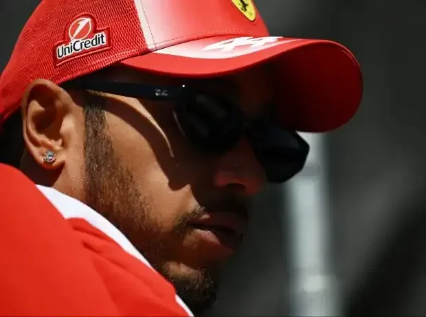 Title image for the news: Lewis Hamilton (Ferrari) with a thoughtful expression at the 2026 Hungarian Grand Prix