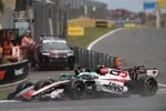 Lance Stroll (Aston Martin) and Oliver Bearman (Haas)
