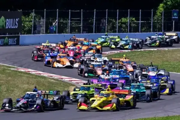 IndyCar Tradition: Lapped Cars Drive Power and Rosenqvist Up the Wall