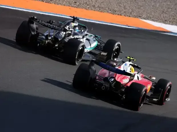 Title image for the news: George Russell (Mercedes W17) and Lewis Hamilton (Ferrari SF-26) at the Formula 1 race in Zandvoort 2026
