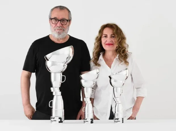 The artists Simeone Crispino and Stella Scala with their Formula 1 trophies for Monza 2026