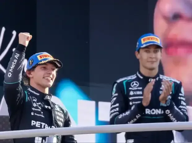 Title image for the news: George Russell (right in the picture) applauds Kimi Antonelli in Monza 2026